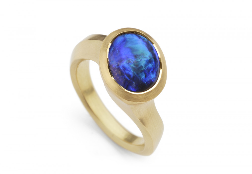 Opal and yellow gold hand carved ring