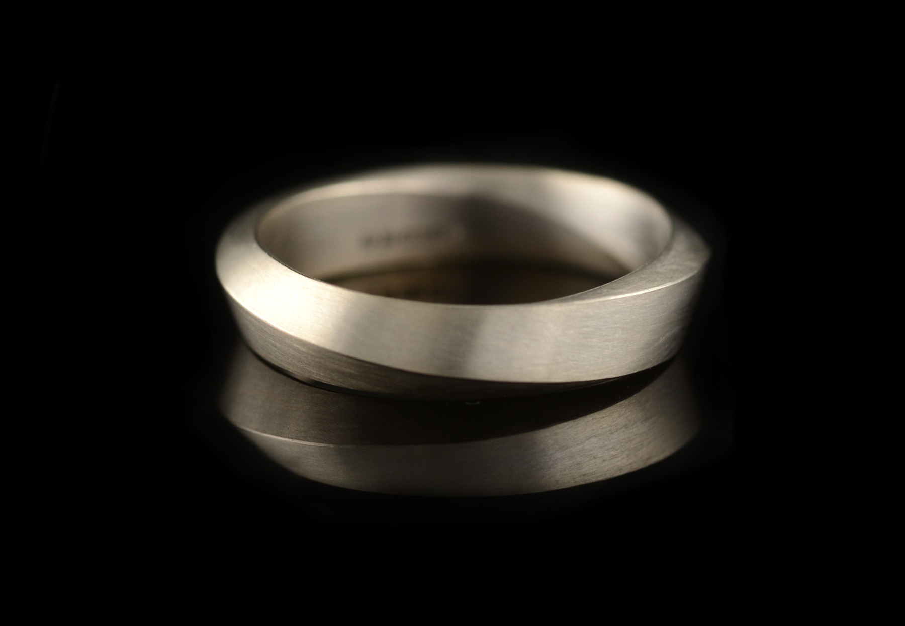 Unusual mens white gold Mobius wedding ring