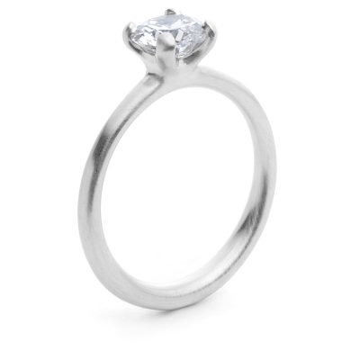 modern platinum and diamond engagement ring with sculpted 4-claw setting