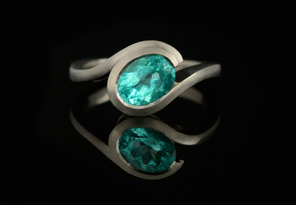 Paraiba tourmaline and platinum 'Wave' engagement ring