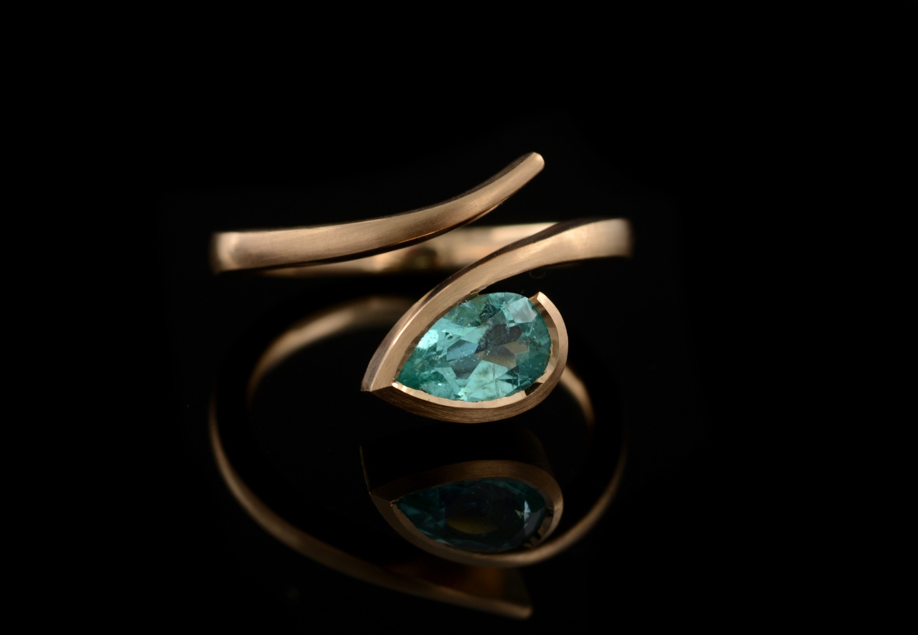 'Twist' rose gold engagement ring with paraiba tourmaline