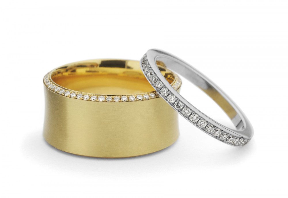 platinum and 18 carat gold wedding and eternity rings, micro pave set with white diamonds