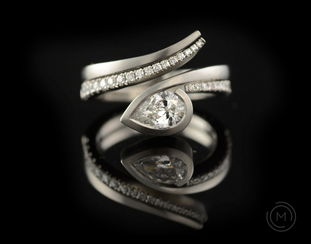platinum fitted wedding band with white diamonds