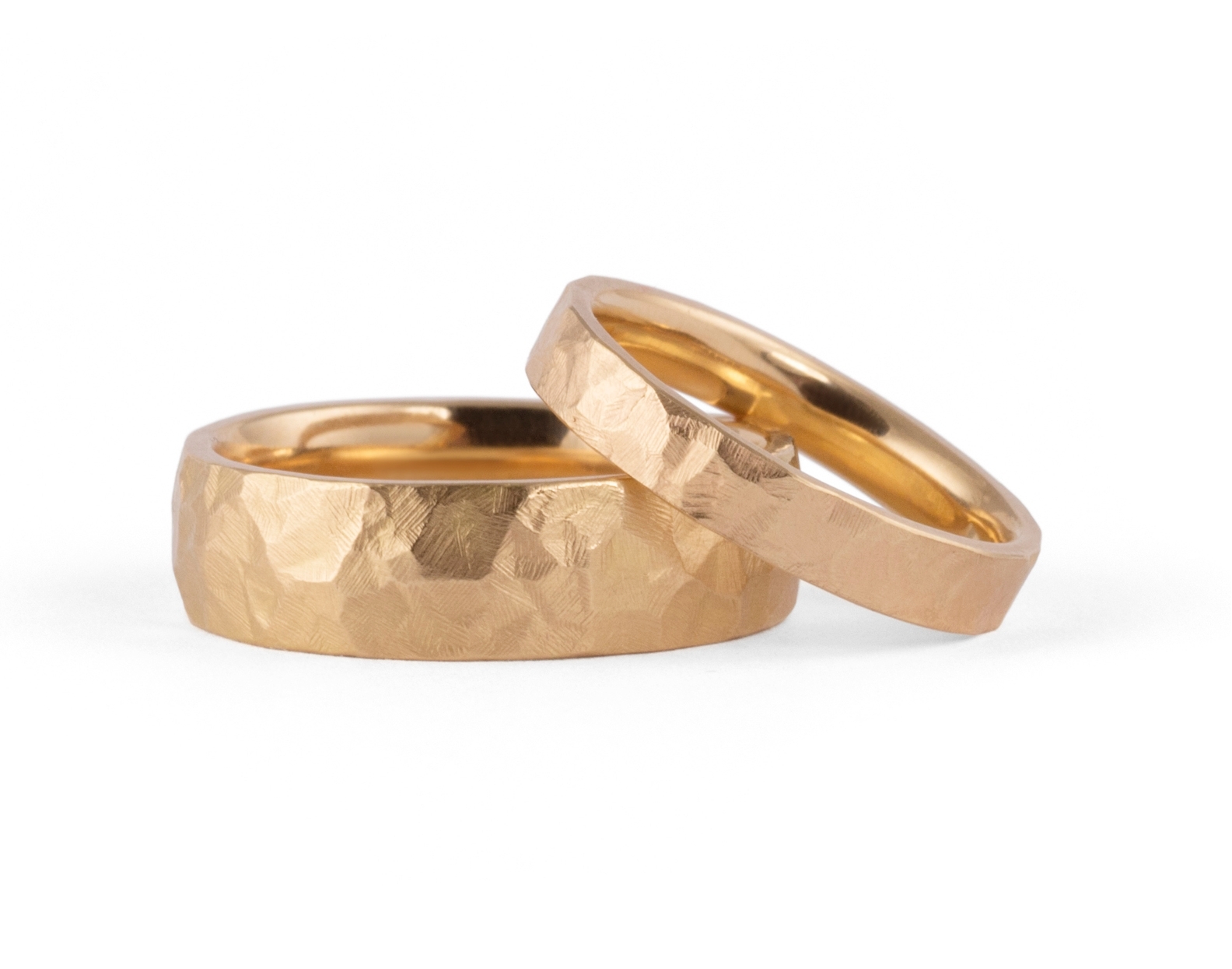 Rose gold hammered wedding rings for men and women
