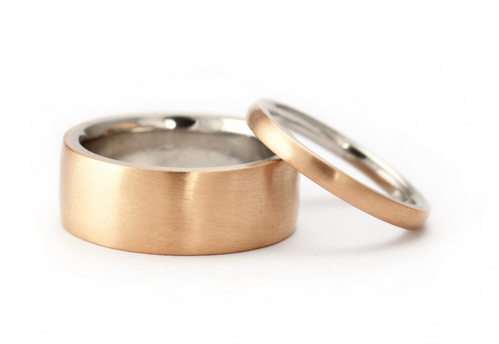 Rose gold and platinum mens wedding ring and women's ring set