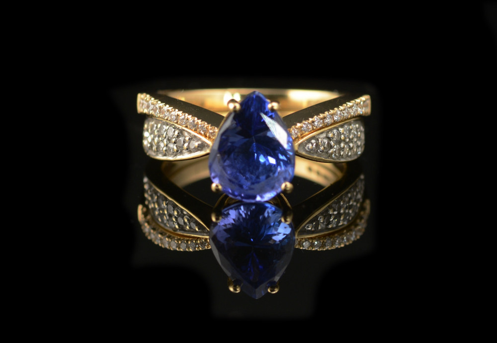 Tanzanite and diamond ring with fitted band