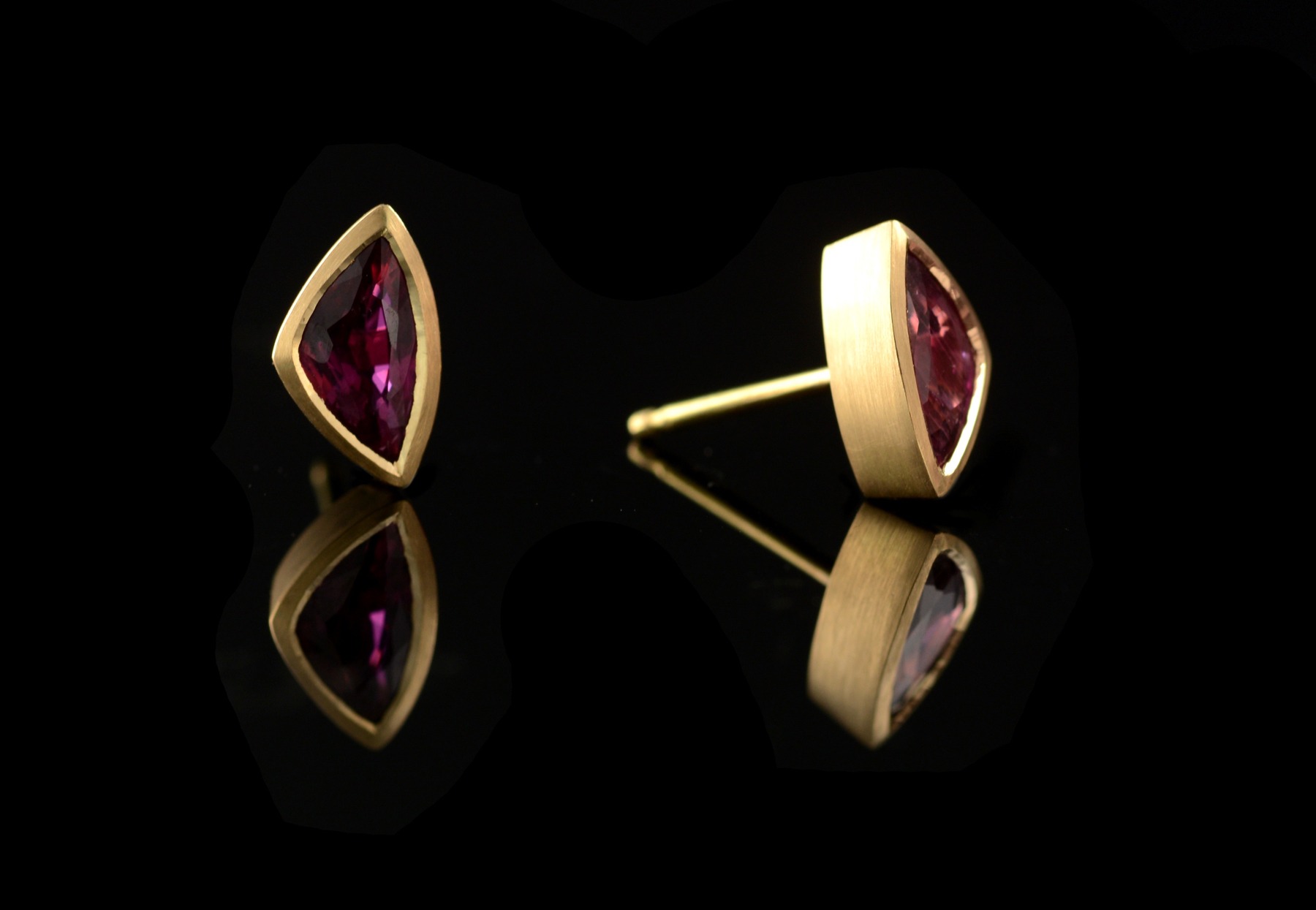 Yellow gold and trillion ruby stud earrings